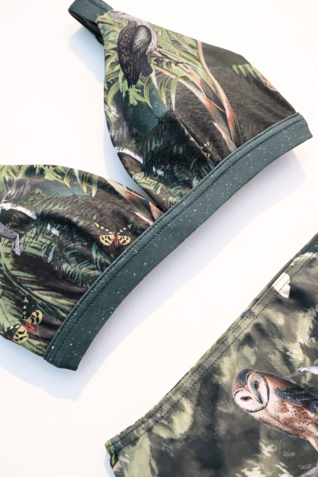 moody flora & fauna design two-piece bikini closeup photograph