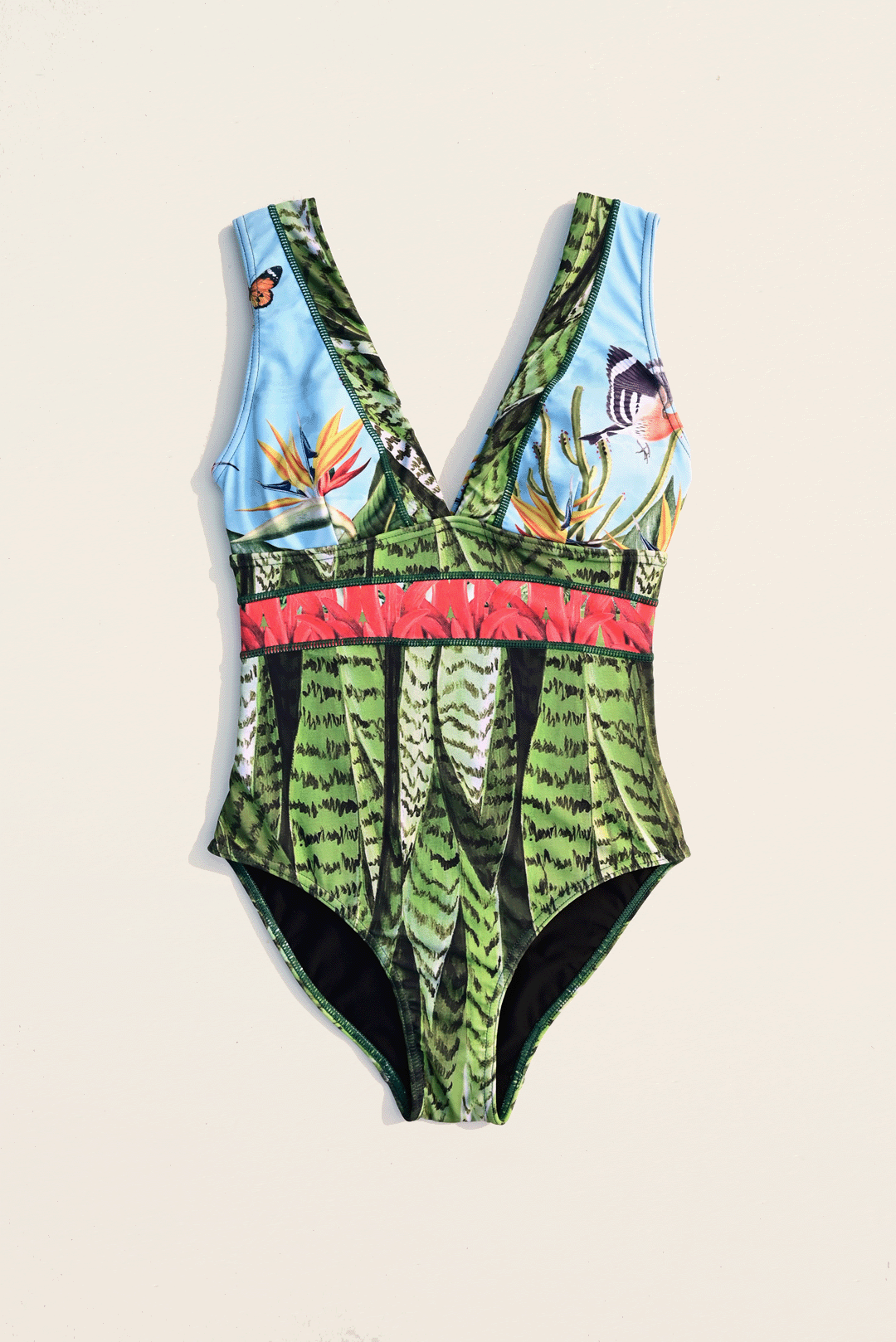 Flora & fauna design one-piece costume flat-lay photograph