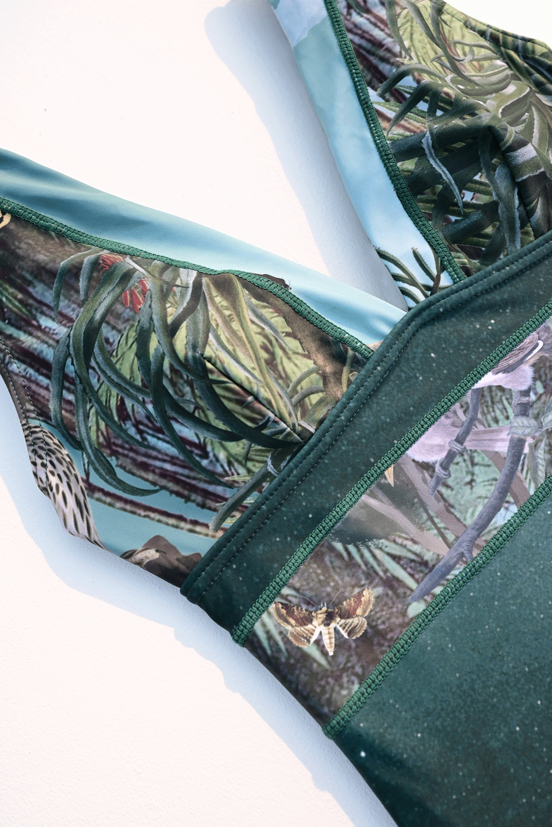 moody flora & fauna design one-piece costume closeup photograph