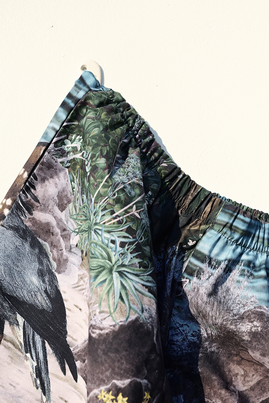 moody flora & fauna design shirt & pants set closeup photograph